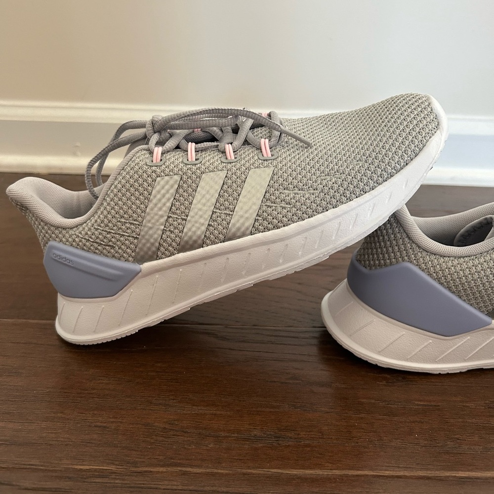 Women’s Adidas, size 6, light gray.  Pink and light blue trim.